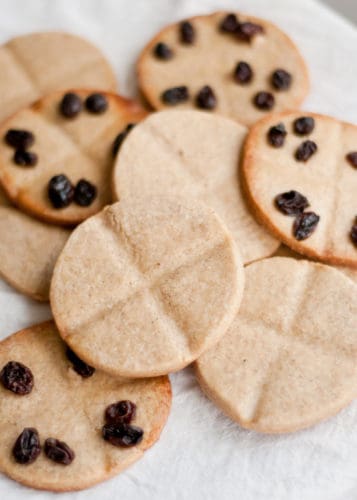 Biscuits with crosses on them and raisins 